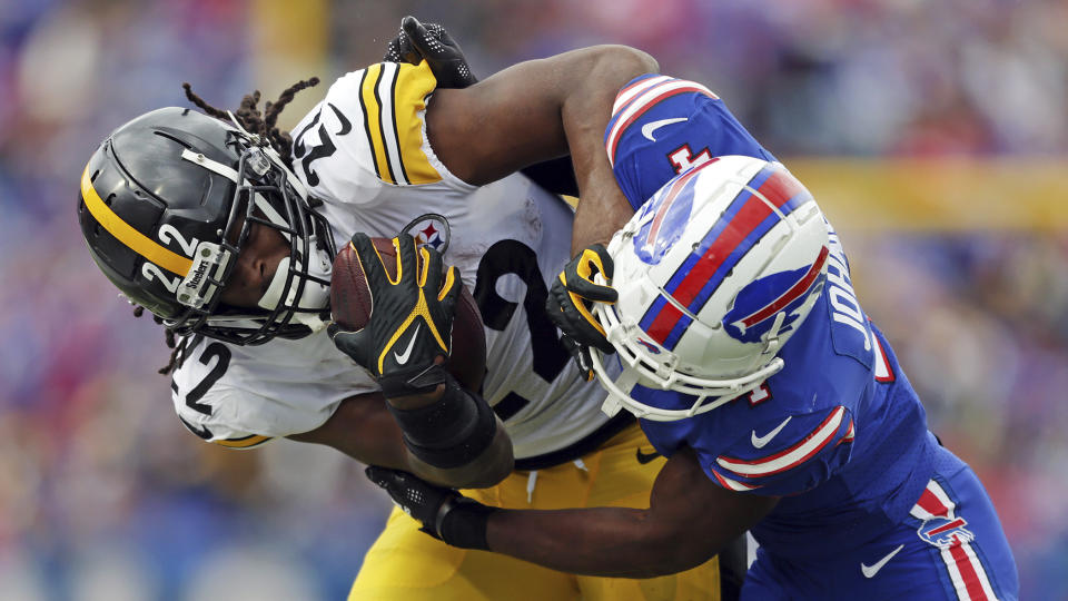 Pittsburgh Steelers running back Najee Harris is tackled by Buffalo Bills safety Jaquan Johnson during the second half of an NFL football game in Orchard Park, N.Y., Sunday, Oct. 9, 2022. (AP Photo/Joshua Bessex)