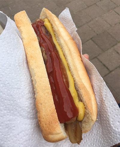 One voter couldn't leave the polling booth without a democracy sausage. Photo: Twitter/bettekanes