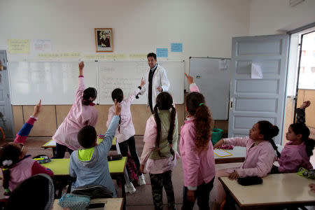 School children listen to a teacher as they study during a class in the Oudaya primary school in Rabat, Morocco January 31, 2019. Picture taken January 31, 2019. REUTERS/Youssef Boudlal