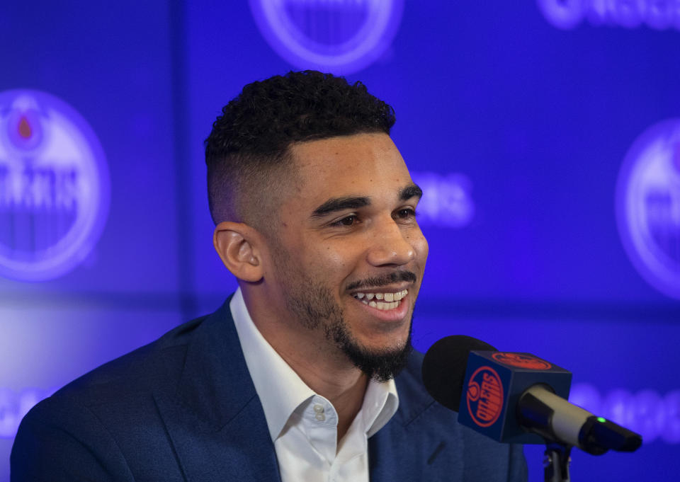 New Edmonton Oilers NHL hockey player Evander Kane speaks during a press conference in Edmonton, Alberta, Friday, Jan. 28, 2022. (Jason Franson/The Canadian Press via AP)