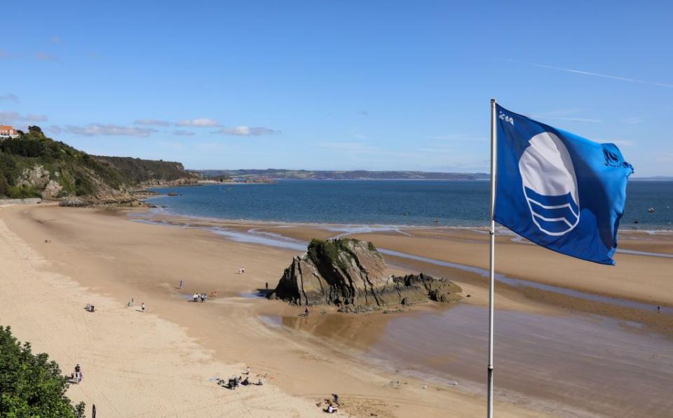 <p>For the best beaches in South Wales, look no further than picturesque Tenby and the harbour town's North Beach. The unrivalled coastal spot is one of the most photographed locations in Wales thanks to its superb sand and Goscar Rock sticking out of the middle of it. A sun trap even on windy days, it has a Blue Flag for its water quality and is overlooked by the town of Tenby.</p><p><strong>Where to stay: </strong>For a seriously impressive holiday cottage that sits right on North Beach, this modern apartment sleeps six and offers incredible views from various spaces. <a class="link " href="https://go.redirectingat.com?id=127X1599956&url=https%3A%2F%2Fwww.holidaycottages.co.uk%2Fcottage%2F60757-goscar-view&sref=https%3A%2F%2Fwww.countryliving.com%2Fuk%2Ftravel-ideas%2Fstaycation-uk%2Fg32996826%2Fbest-beaches-wales%2F" rel="nofollow noopener" target="_blank" data-ylk="slk:SEE INSIDE;elm:context_link;itc:0;sec:content-canvas">SEE INSIDE</a></p>