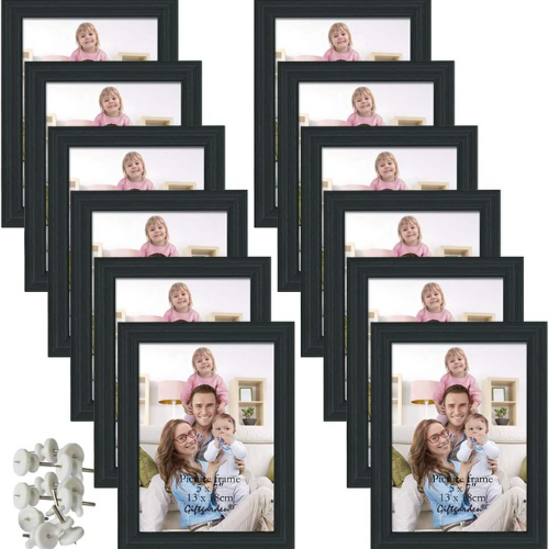 Multiple black amazon frames with image of family inside