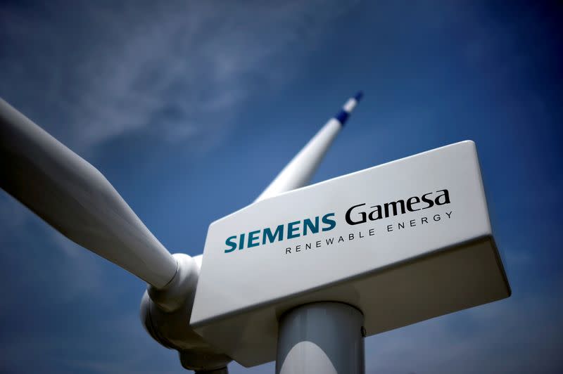 FILE PHOTO: A model of a wind turbine with the Siemens Gamesa logo is displayed outside the annual general shareholders meeting in Zamudio