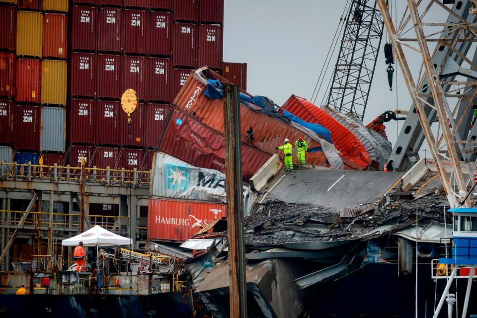 PHOTO: Salvage crew members work on the deck of the cargo ship Dali as they work to free it in the Patapsco River in Baltimore, MD,  May 10, 2024. (Kevin Dietsch/Getty Images)