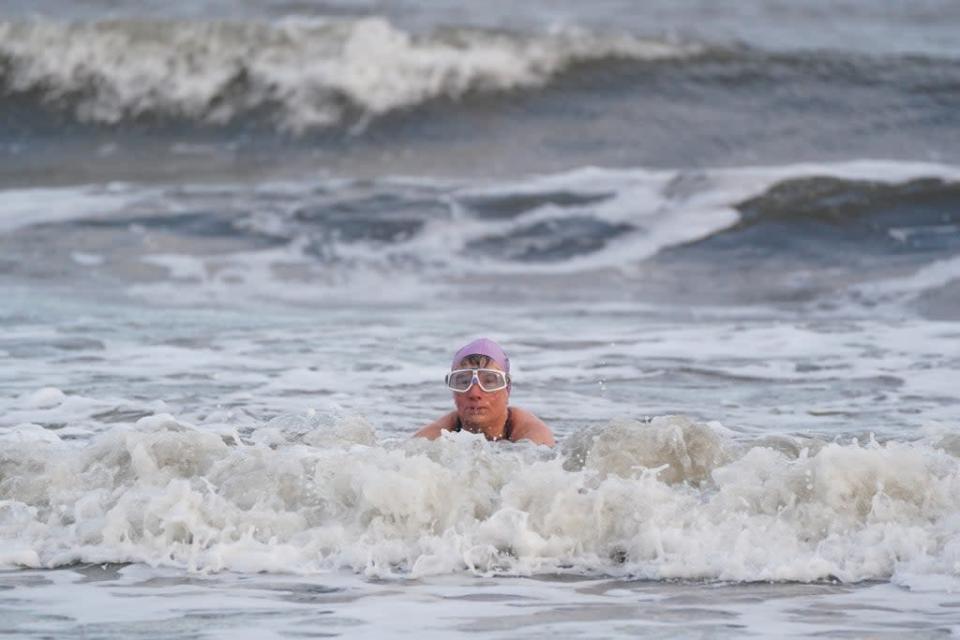 A wild swimmer takes a Christmas Day dip at Portobello Beach (Andrew Milligan/PA) (PA Wire)