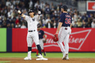 New York Yankees' Oswaldo Cabrera reacts after hitting a double as Boston Red Sox first baseman Triston Casas (36) watches during the fourth inning of a baseball game Sunday, Sept. 25, 2022, in New York. (AP Photo/Jessie Alcheh)