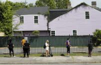 People line up for COVID-19 testing at a mobile testing site in New Orleans, Wednesday, July 8, 2020. Testing sites in New Orleans have been running out of their daily allocation of tests within minutes of opening. (AP Photo/Gerald Herbert)