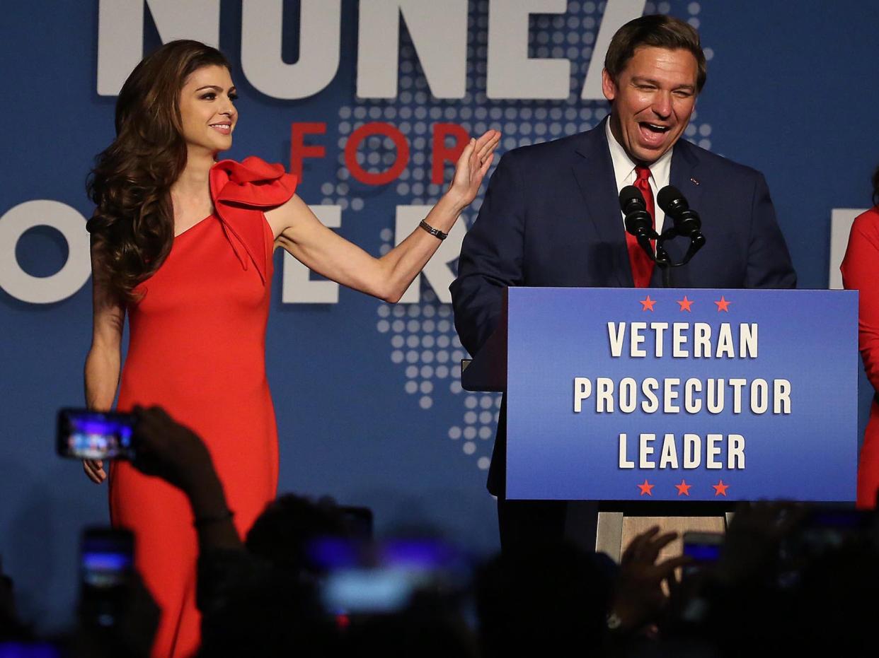 Ron DeSantis and his wife Casey celebrate after winning the Florida governor's race during DeSantis' party at the Rosen Centre in Orlando, Florida, on Tuesday, November 6, 2018.