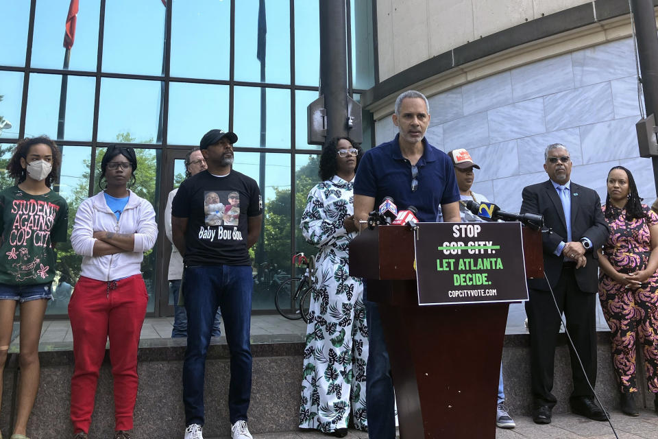 Community organizer Kamau Franklin speaks during a news conference outside Atlanta's City Hall, Wednesday, June 7, 2023, to announce an effort to force a referendum that would allow Atlanta voters to decide whether the construction of a proposed police and firefighter training center should proceed. Under the proposed referendum, voters would choose whether they want to repeal the ordinance that authorized the lease of the city-owned land upon which the project, which opponents call Cop City, is being built. (AP Photo/R.J. Rico)