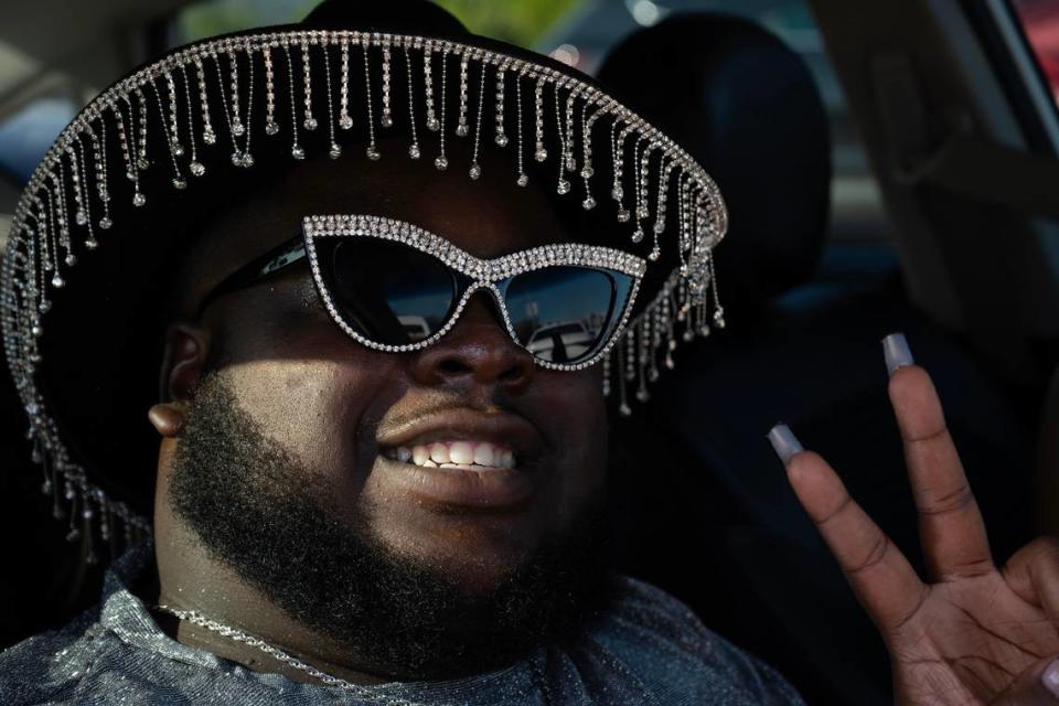 Malachi Taylor waits to get into the parking lot of GEHA Field at Arrowhead Stadium for the Beyoncé concert on Sunday.