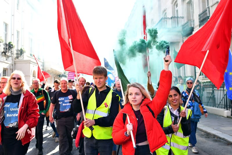 EU supporters, calling on the government to give Britons a vote on the final Brexit deal, attend a 'People's Vote' march in London