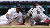 St. Louis Cardinals catcher Yadier Molina, right, tags Detroit Tigers' Isaac Paredes out at home plate in the sixth inning of a baseball game in Detroit, Wednesday, June 23, 2021. (AP Photo/Paul Sancya)