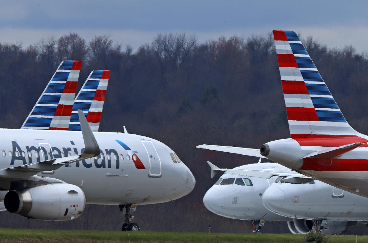 FILE - In this March 31, 2020 file photo American Airlines planes are parked at Pittsburgh International Airport in Imperial, Pa. American Airlines reports earnings on Thursday, Oct. 19, 2023/ (AP Photo/Gene J. Puskar, file)