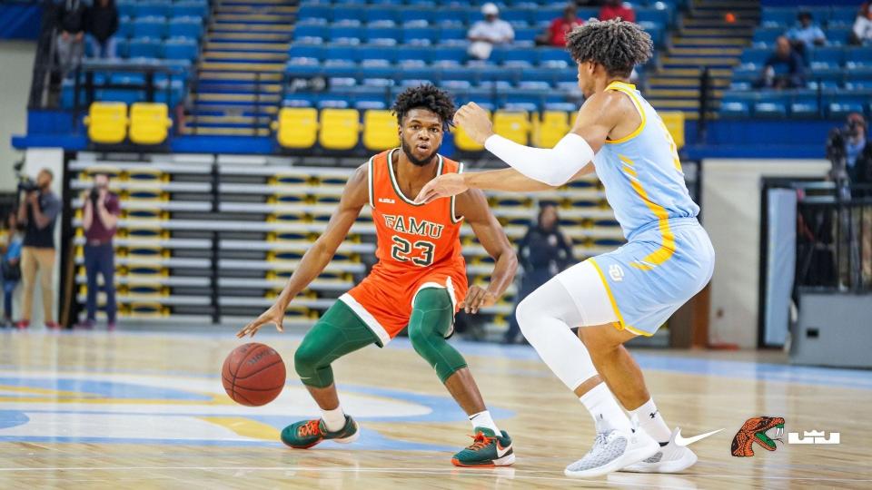 Florida A&M University men's basketball Jordan Tillmon (23) attempts to get around Southern defender Terrell Williams Jr. against Southern at F.G Clark Activity Center, Baton Rouge, Louisiana, Sat. Jan. 7, 2023