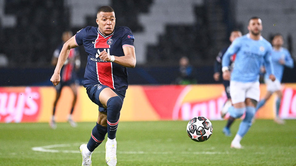 Seen here, PSG superstar Kylian Mbappe dribbles the ball against Man City.