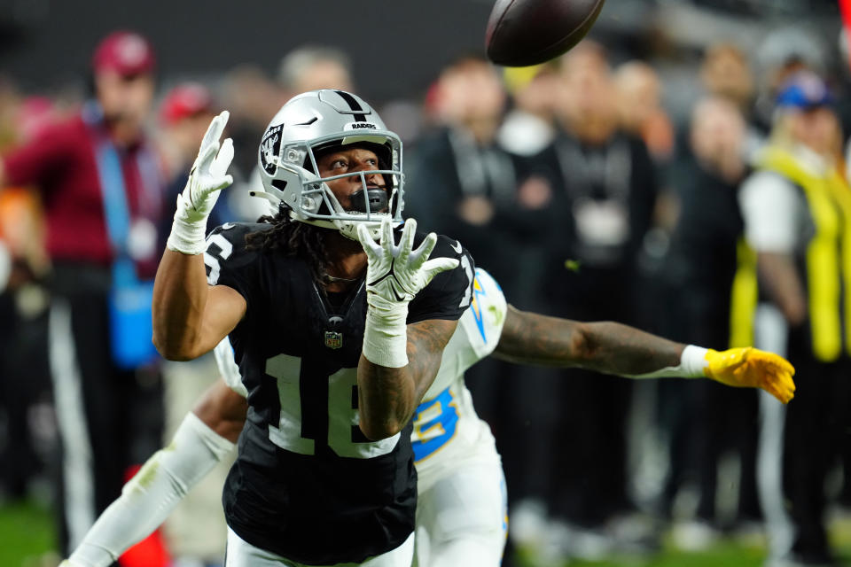 Dec 14, 2023; Paradise, Nevada, USA; Las Vegas Raiders wide receiver Jakobi Meyers (16) makes a catch for a touchdown against the Los Angeles Chargers in the first quarter at Allegiant Stadium. Mandatory Credit: Stephen R. Sylvanie-USA TODAY Sports
