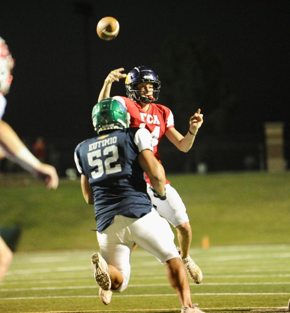 Wylie's Aden Kincaid throws a touchdown pass at the Big Country FCA All-Star Game.