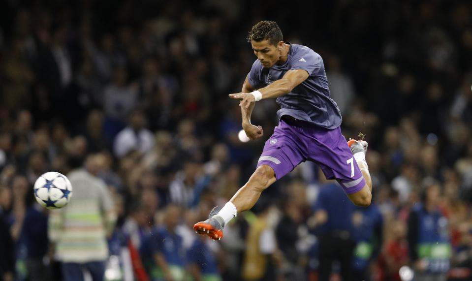 <p>Real Madrid’s Cristiano Ronaldo warms up before the match </p>