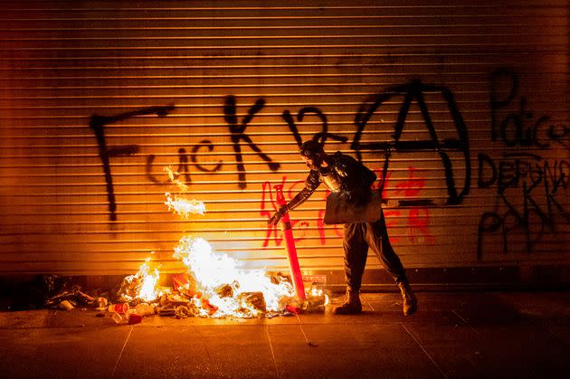 A fire burns outside the federal courthouse in Portland in August 2020. Backlash to civil unrest in the city was a political obstacle for many Oregon Democrats this election cycle.