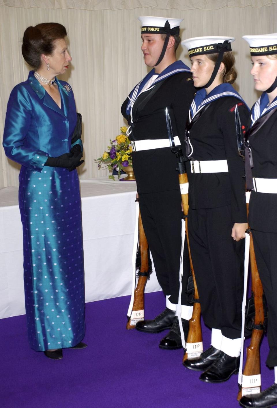 <p>Princess Anne wore a matching silk dress and jacket with dot detailing in the skirt for a dinner held at the Royal Victoria Dock.</p>