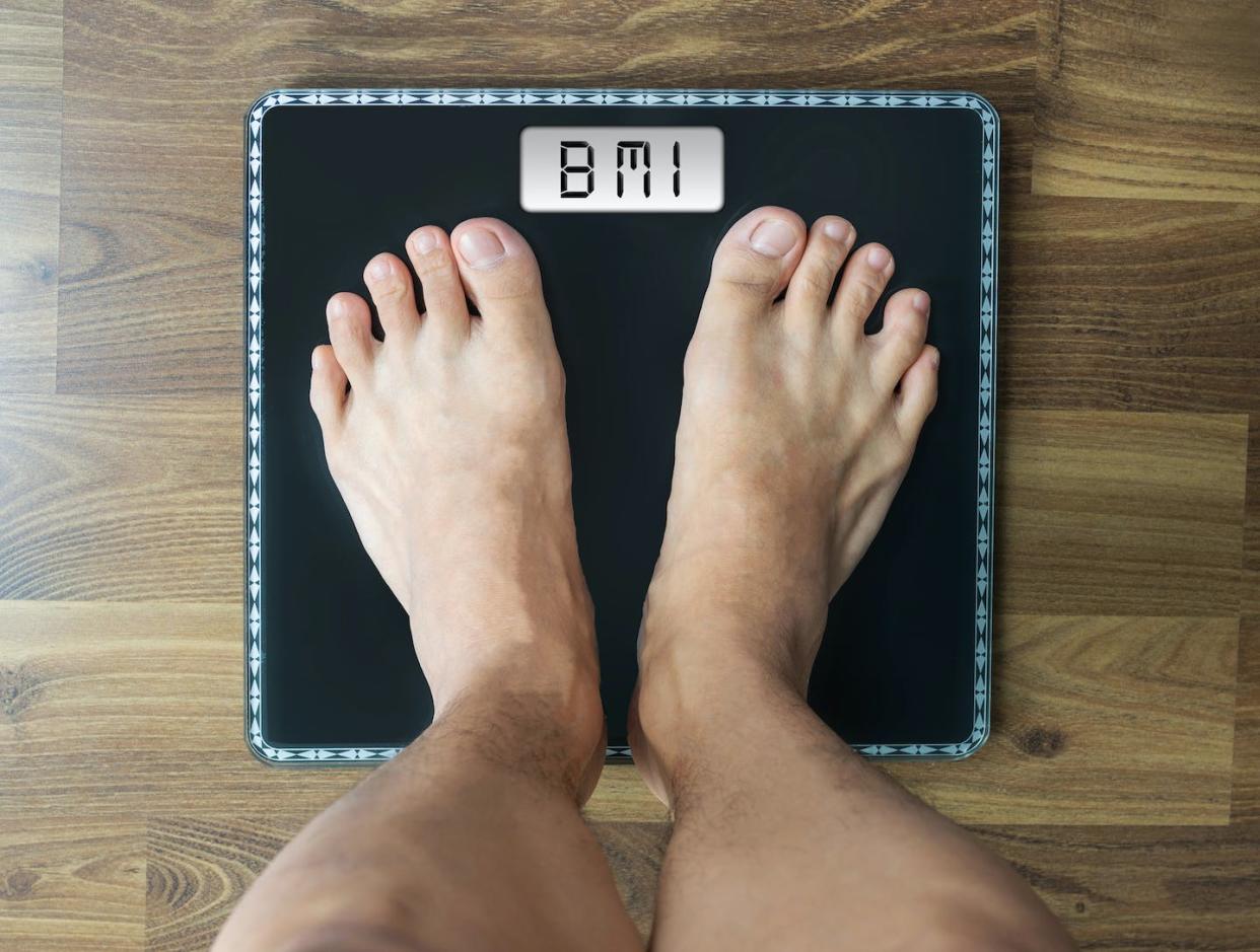 Body mass index has been the standard measure to classify obesity and overweight for decades. <a href="https://www.gettyimages.com/detail/photo/text-on-digital-weighing-scale-persons-looking-down-royalty-free-image/1076583812?adppopup=true" rel="nofollow noopener" target="_blank" data-ylk="slk:kaipong/iStock via Getty Images;elm:context_link;itc:0;sec:content-canvas" class="link ">kaipong/iStock via Getty Images</a>