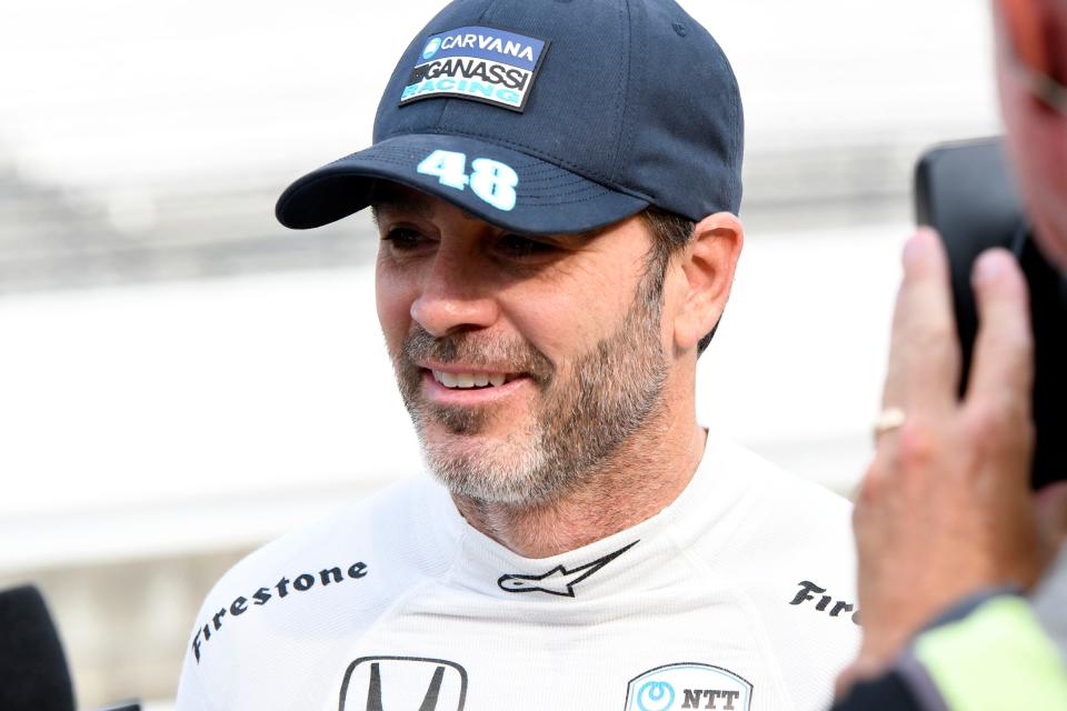 Chip Ganassi Racing driver Jimmie Johnson (48) takes an interview Saturday, May 21, 2022, during practice before the first day of qualifying for the 106th running of the Indianapolis 500 at Indianapolis Motor Speedway