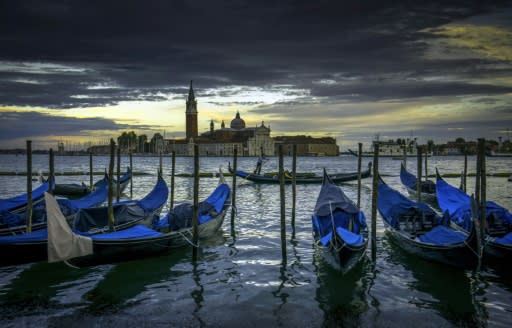 The many canals of Venice are a popular tourist draw