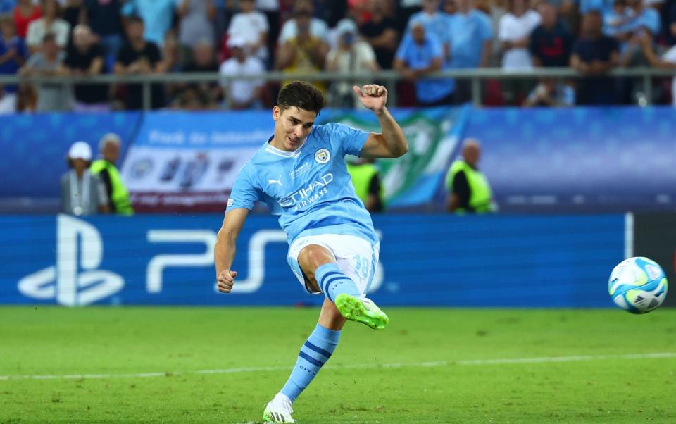 ulian Alvarez of Manchester City scores a penalty in a shootout of the Super Cup