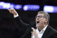 Connecticut coach Geno Auriemma communicates with players during the first half of an NCAA college basketball game against South Carolina, Monday, Feb. 10, 2020, in Columbia, S.C. (AP Photo/Sean Rayford)