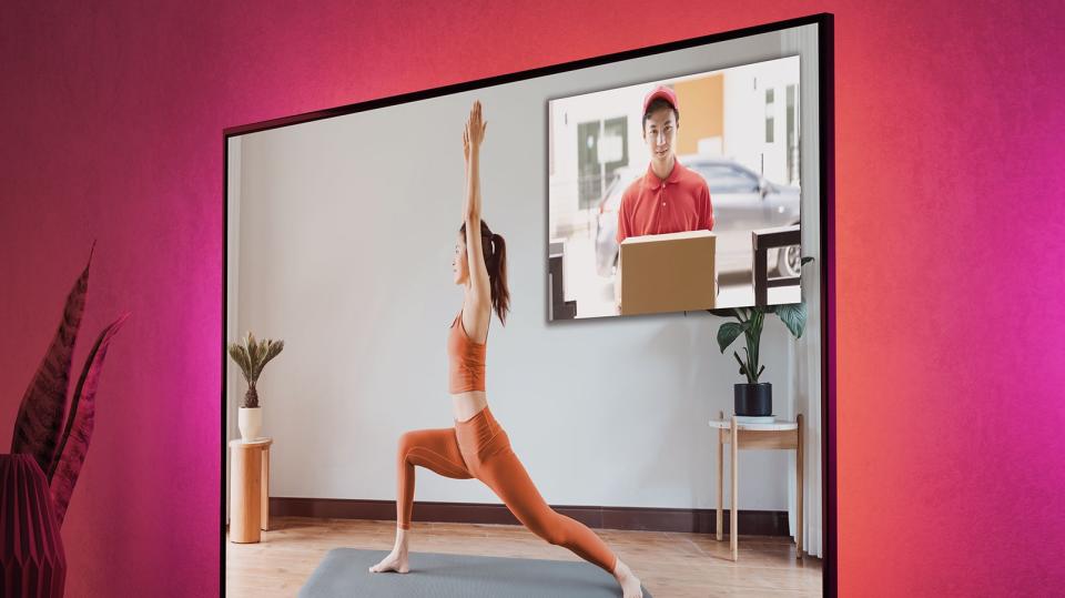 The Live View picture in picture mode on Amazon Fire TV Stick 4K Max, with the feed of a delivery person in the corner of a yoga routine video