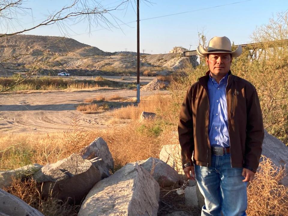 Civil engineer Oscar David "Jay" Ornelas stands by the dry banks of the Rio Grande off Paisano Drive in El Paso. Ornelas starts in January as the general manager of the El Paso County Water Improvement District No. 1.