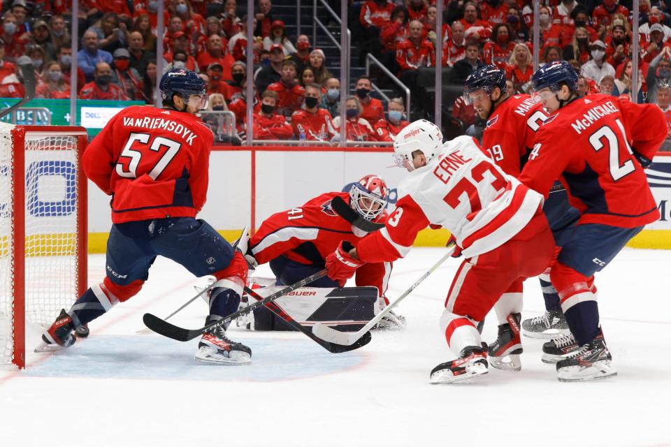 Detroit Red Wings left wing Adam Erne (73) scores a goal on Washington Capitals goaltender Vitek Vanecek (41) during the second period at Capital One Arena on Wednesday, Oct. 27, 2021.