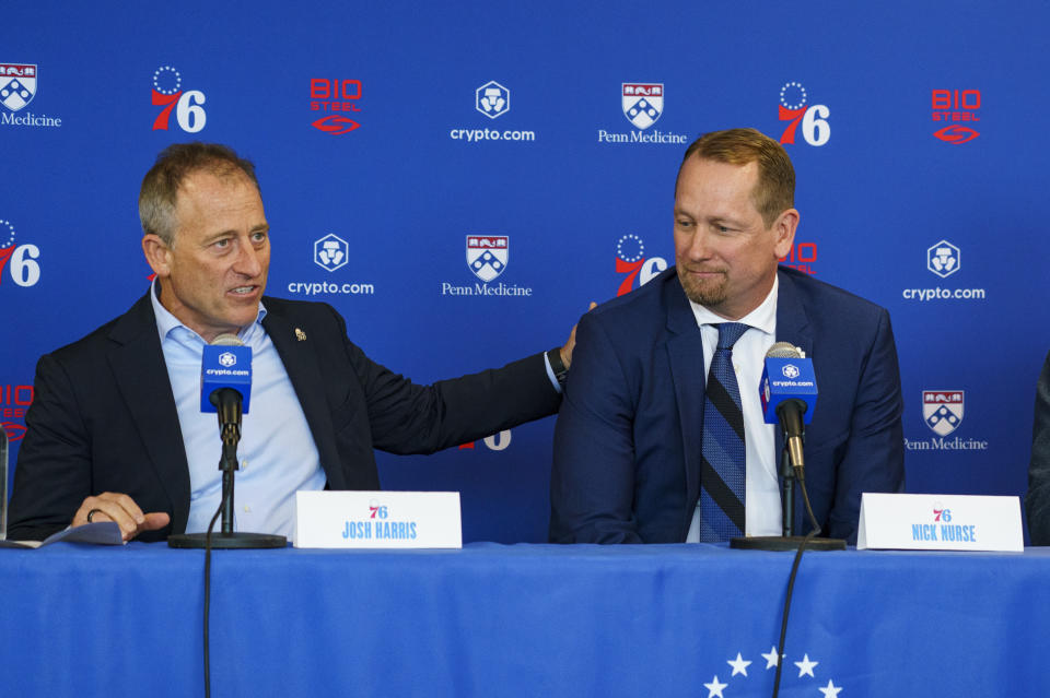 Philadelphia 76ers owner Josh Harris, left, introduces head coach Nick Nurse during a press conference at the NBA basketball team's facility, Thursday, June 1, 2023, in Camden, N.J. (AP Photo/Chris Szagola)