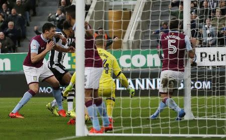 Britain Football Soccer - Newcastle United v Aston Villa - Sky Bet Championship - St James' Park - 20/2/17 Newcastle United's Yoan Gouffran celebrates after Aston Villa's Henri Lansbury (R) scores an own goal for Newcastle United's second Mandatory Credit: Action Images / Craig Brough Livepic