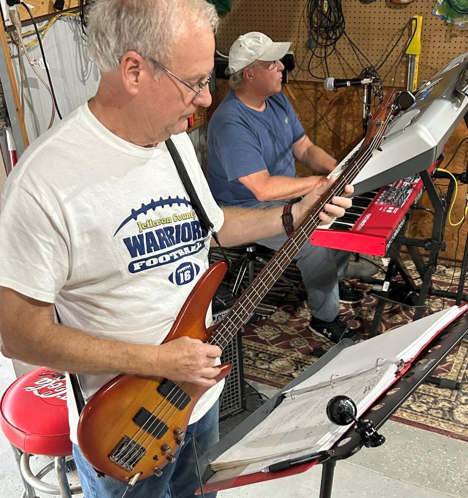 Jimmy Fleming on bass guitar and Jerry Weeks on keyboards.