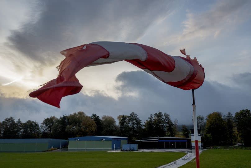 A wind cone moves at a small airport in Wehrheim near Frankfurt, Germany, Wednesday, Nov. 1, 2023.