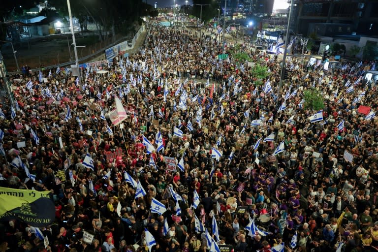 Thousands rallied in the Israeli city of Tel Aviv for the hostages held in Gaza, calling on the government to 'Bring them home' (JACK GUEZ)
