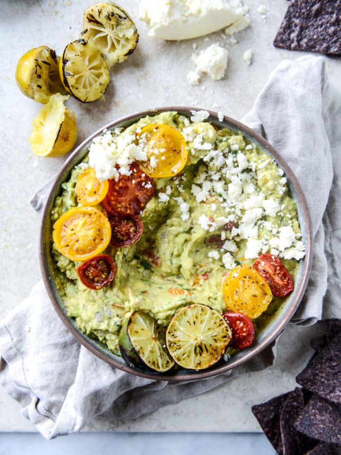 <strong>Get the <a href="http://www.howsweeteats.com/2016/04/roasted-tomato-and-charred-lime-guacamole/" target="_blank">Charred Lime And Roasted Tomato Guacamole recipe</a>&nbsp;from How Sweet It Is</strong>