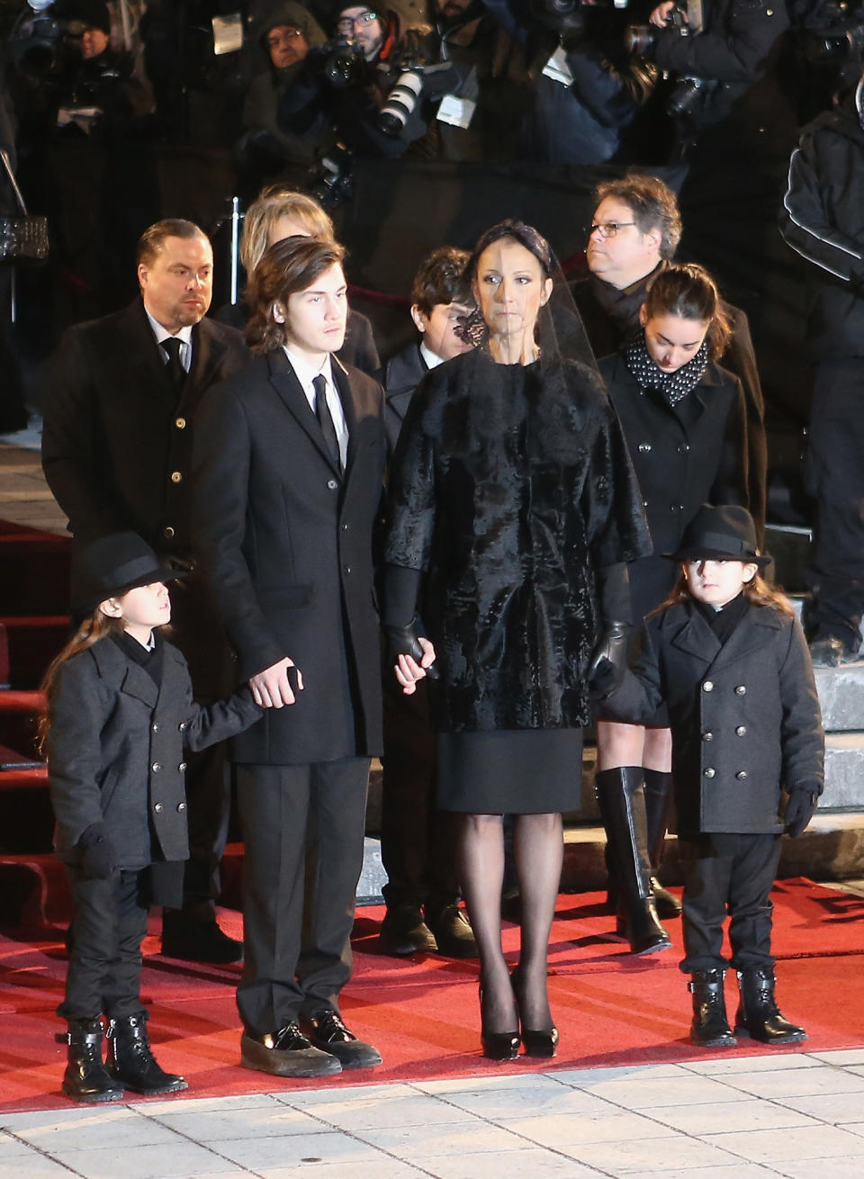Recording artist Celine Dion and children Rene-Charles Angelil, Eddy Angelil and Nelson Angelil attend the State Funeral Service for Celine Dion's Husband Rene Angelil