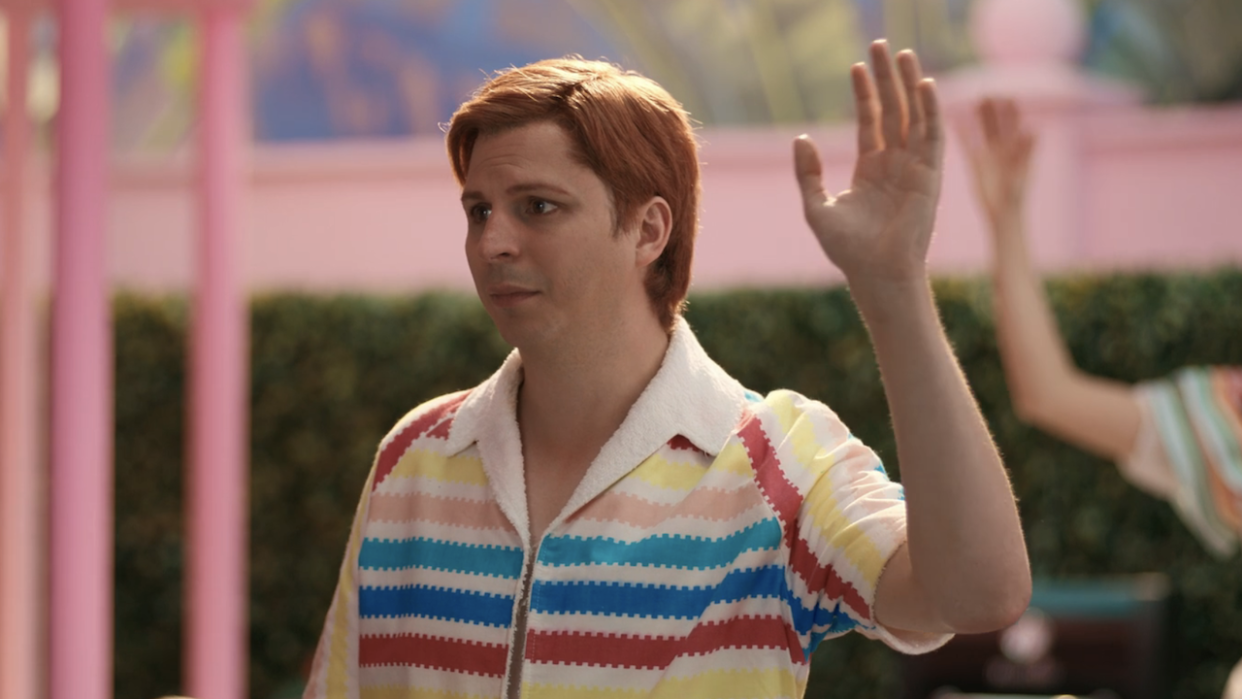  Michael Cera as Alan waving at the end of Barbie. 