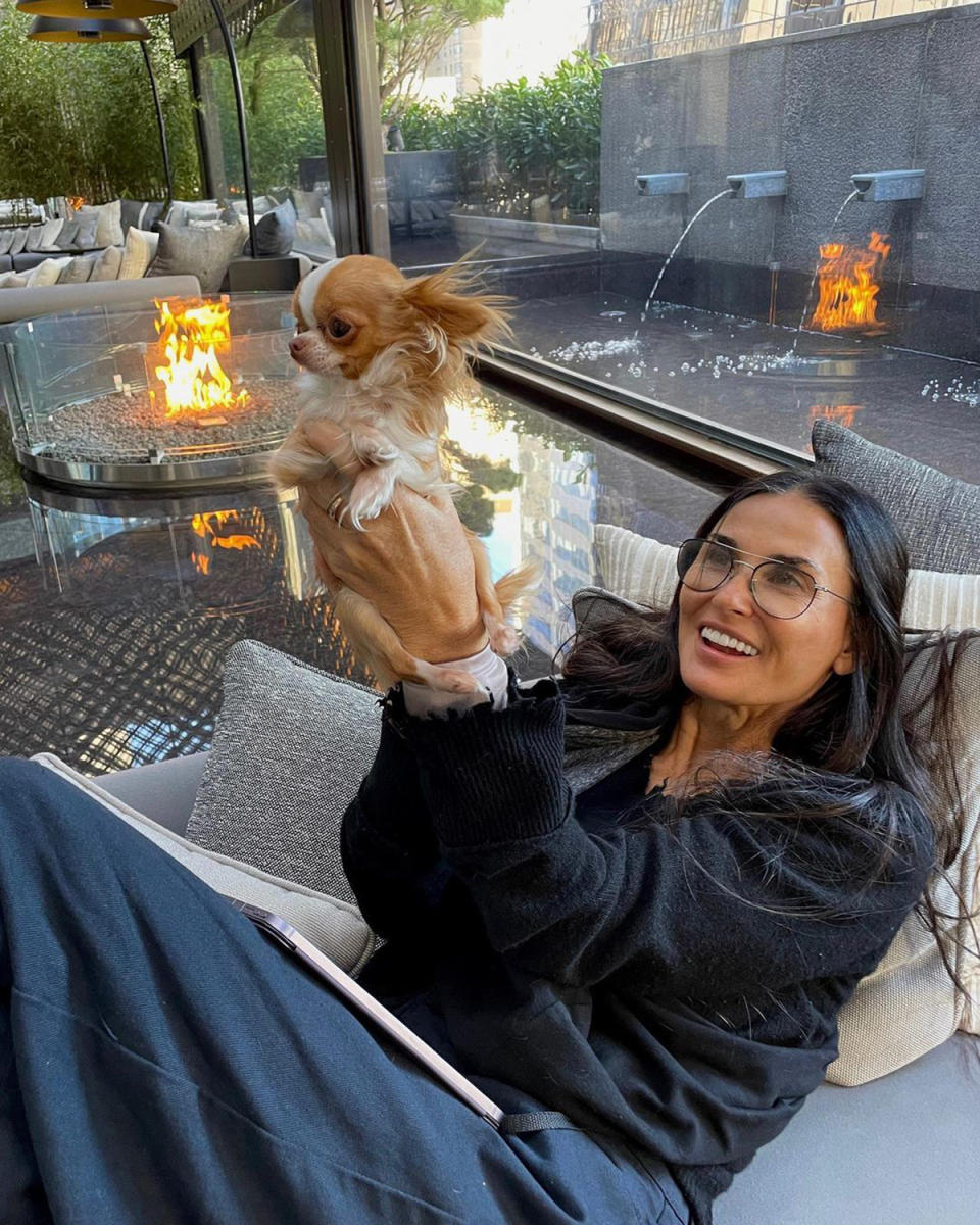 <p><strong>Location:</strong> New York City</p> <p>Demi Moore is enjoying one of New York City's most luxurious accommodations! The actress recently lodged at Midtown's <a href="https://www.aman.com/hotels/aman-new-york" rel="nofollow noopener" target="_blank" data-ylk="slk:Aman New York;elm:context_link;itc:0;sec:content-canvas" class="link ">Aman New York</a> located in the historic Crown Building. Moore shared a glimpse of her stay on <a href="https://www.instagram.com/p/ClEYBN6O3hv/" rel="nofollow noopener" target="_blank" data-ylk="slk:Instagram;elm:context_link;itc:0;sec:content-canvas" class="link ">Instagram</a>, which featured a shot of her lounging by a cozy fire with her dog.</p> <p>"A little morning reading at <a href="https://www.instagram.com/amannewyork/" rel="nofollow noopener" target="_blank" data-ylk="slk:@amannewyork;elm:context_link;itc:0;sec:content-canvas" class="link ">@amannewyork</a> 🤍 Thanks for a beautiful stay!" she captioned the post.</p> <p>Along with its proximity to Central Park, the hotel boasts a variety of unique experiences such as its Hammam and Banya spa houses, a speakeasy-style Jazz Club and diverse dining options.</p>