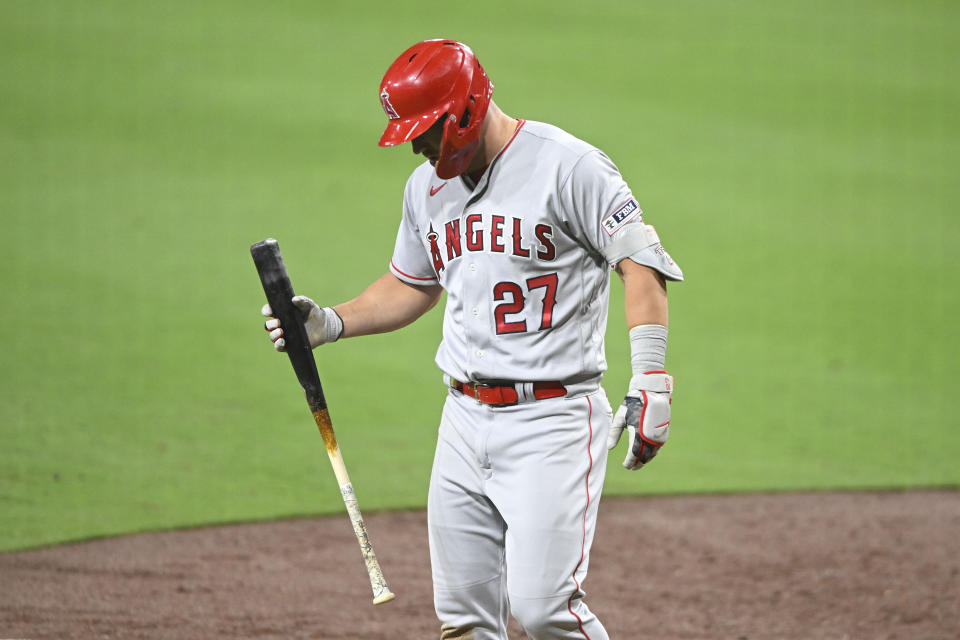 Los Angeles Angels' Mike Trout (27) leaves the game during the eighth inning of a baseball game against the San Diego Padres Monday, July 3, 2023, in San Diego. (AP Photo/Denis Poroy)