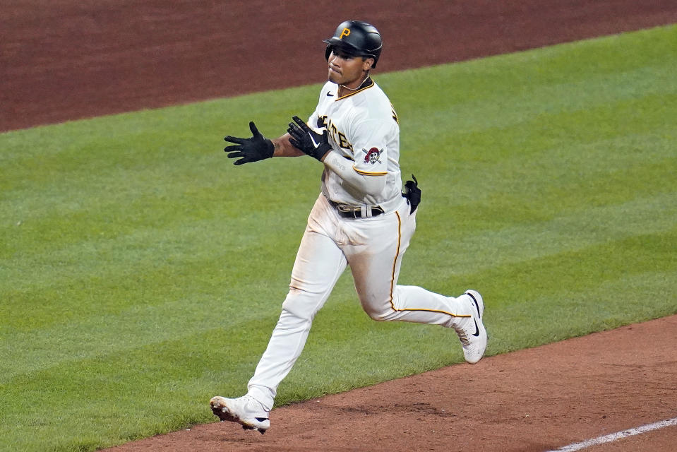 Pittsburgh Pirates' Cal Mitchell rounds third after hitting a two-run home run off Philadelphia Phillies starting pitcher Zack Wheeler during the seventh inning of a baseball game in Pittsburgh, Thursday, July 28, 2022. (AP Photo/Gene J. Puskar)