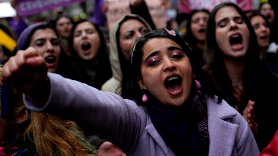 PHOTO: Women shout slogans during a protest to mark International Women's Day in Istanbul, Turkey, March 8, 2024.  (Khalil Hamra/AP)