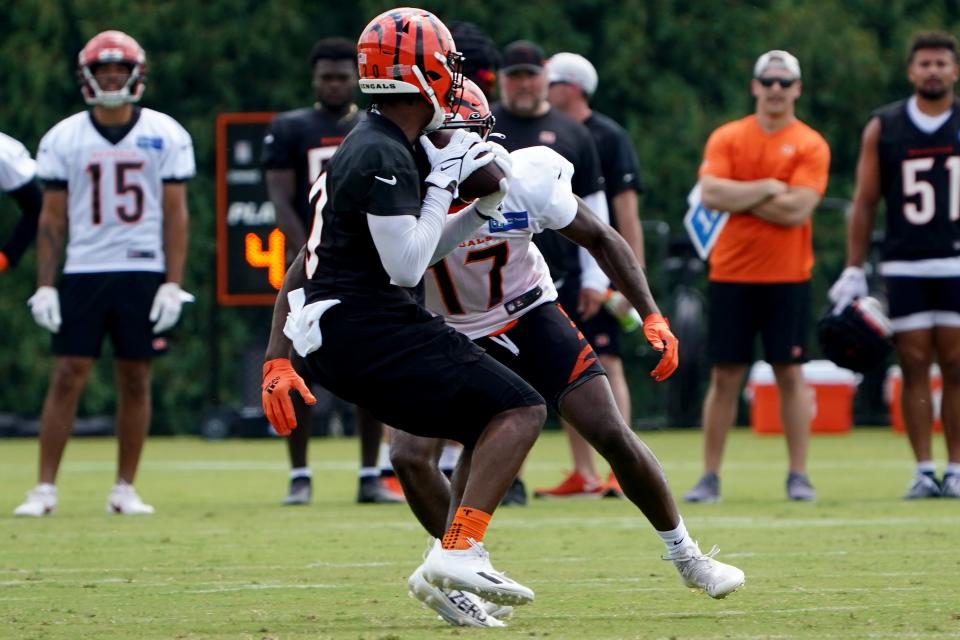 Cincinnati Bengals cornerback Eli Apple (20) intercepts a pass intended for Cincinnati Bengals wide receiver Stanley Morgan (17) during Cincinnati Bengals training camp practice, Friday, July 29, 2022, at the practice fields next to Paul Brown Stadium in Cincinnati. 