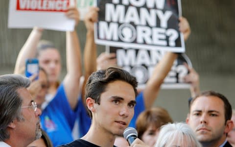 David Hogg a senior at Marjory Stoneman Douglas High School speaks at a rally calling for more gun control in Fort Lauderdale - Credit: Reuters