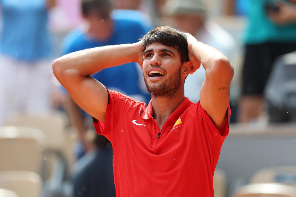 PARIS, FRANCE - AUGUST 01: Carlos Alcaraz of Team Spain celebrates victory against Tommy Paul of Team United States during the Men's Singles Quarter-final match on day six of the Olympic Games Paris 2024 at Roland Garros on August 01, 2024 in Paris, France. (Photo by Carl Recine/Getty Images)