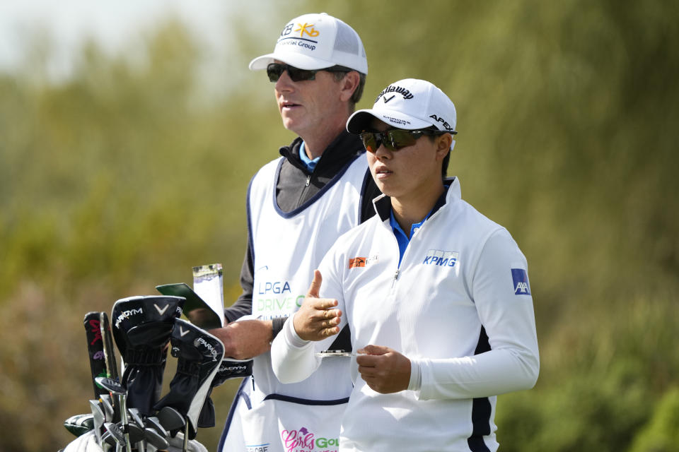 Yuka Saso, of Japan, prepares to hit from the eighth tee during the first round of the Drive On Championship golf tournament, Thursday, March 23, 2023, in Gold Canyon, Ariz. (AP Photo/Matt York)