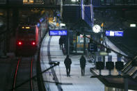 A local train stands at Hamburg Central Station after the start of the strike in Hamburg, Germany, Thursday, Dec. 7, 2023. The GDL union said the strike will affect passenger services operated by state-owned Deutsche Bahn from 10 p.m. on Thursday until 10 p.m. on Friday. Freight trains will be hit from 6 p.m. Thursday. (Bodo Marks/dpa via AP)