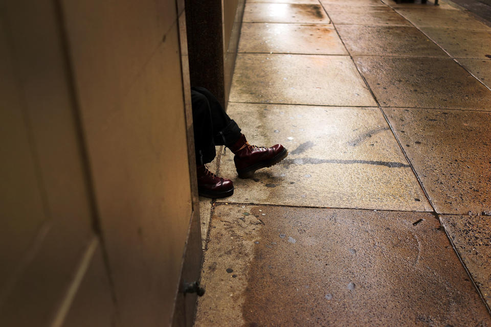 A&nbsp;man sitting in a doorway in downtown Philadelphia, one of the first HUD grant recipients to submit an assessment under the AFFH rule.&nbsp;&ldquo;It was a lift, but it proved to be a worthwhile lift,&rdquo; Anne Fadullon, the city&rsquo;s director of planning and development, said of the process. (Photo: Spencer Platt / Getty Images)